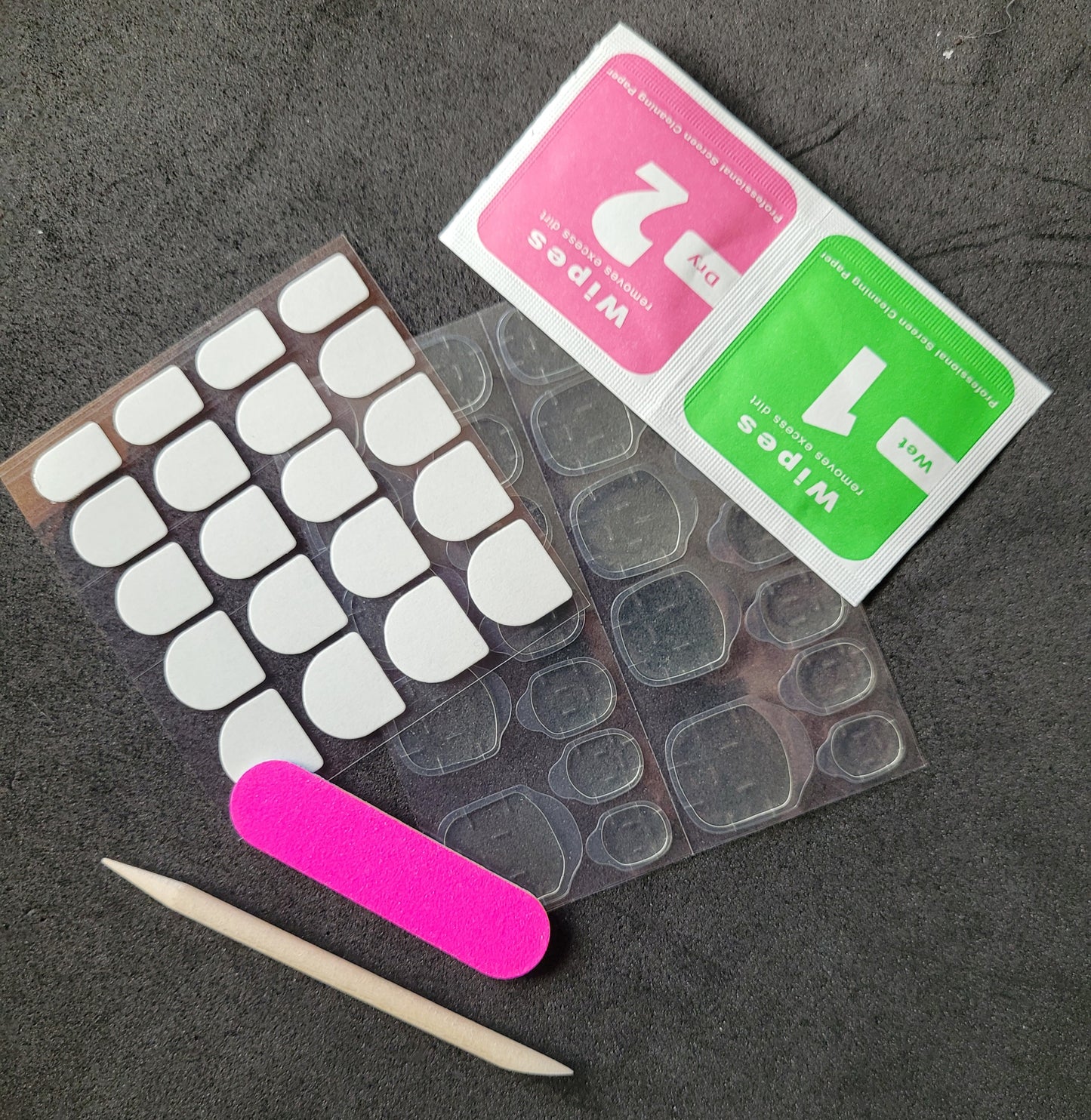 Nail adhesive refill kit