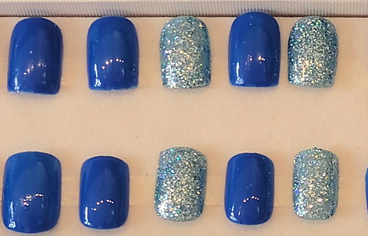 Handpainted set of 24 short square nails. Plain and glitter design